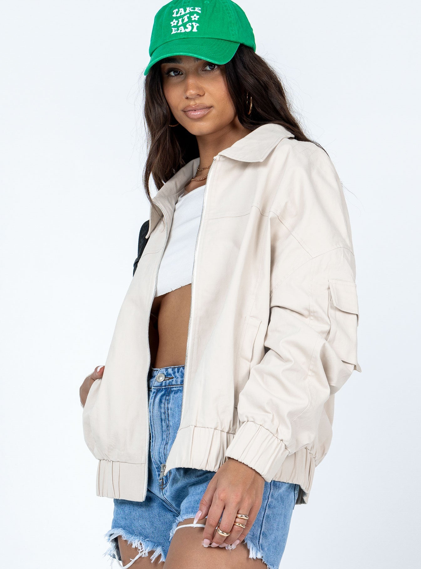 Jacket  Oversized fit  Shell: 100% cotton  Lining: 100% polyester  Classic collar  Twin hip pockets  Arm pockets  Zip front fastening  Elasticated waistband & cuffs 