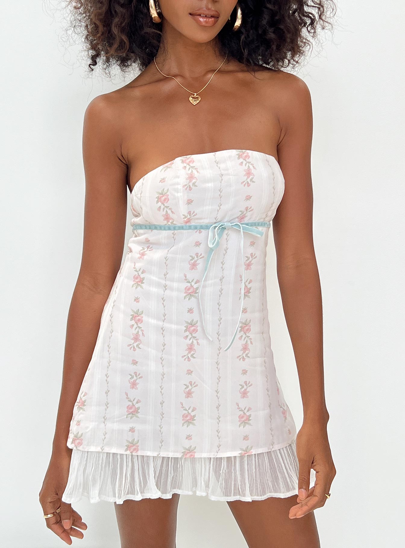 Front view of model wearing  front Princess Polly Square Neck  Odette Mini Dress Pink Multi