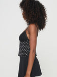 Cami top Polka dot print, v-neckline, lace detail on bust, adjustable strap Non-stretch material, fully lined 