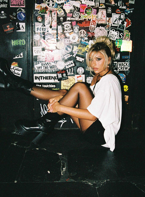 side view of model wearing Princess Polly Kippa Off The Shoulder Tee White Half Sleeves Asymmetric Neckline 