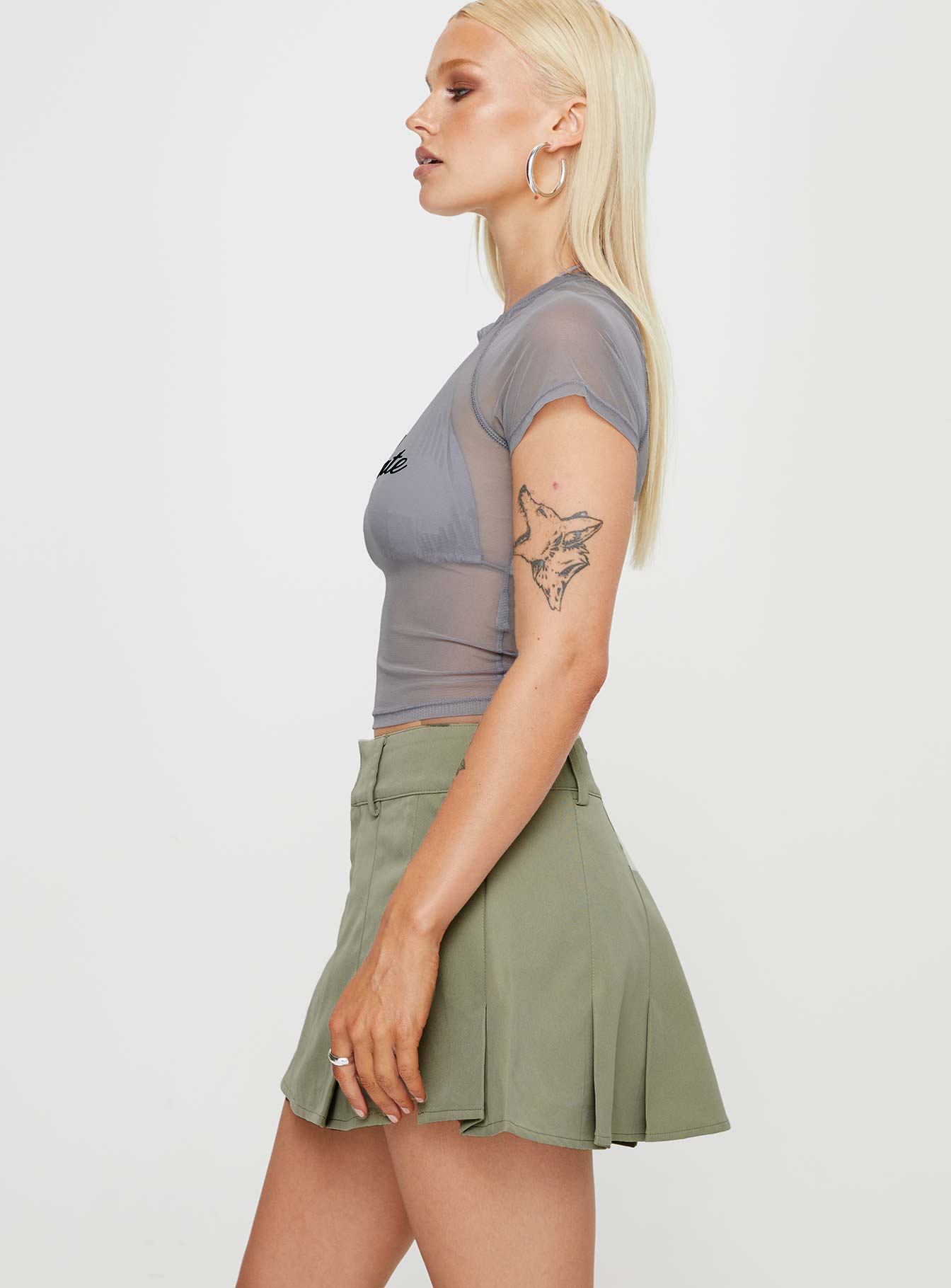 Green Mini skort Belt looped waist zip and button front fastening pleated hem built in shorts