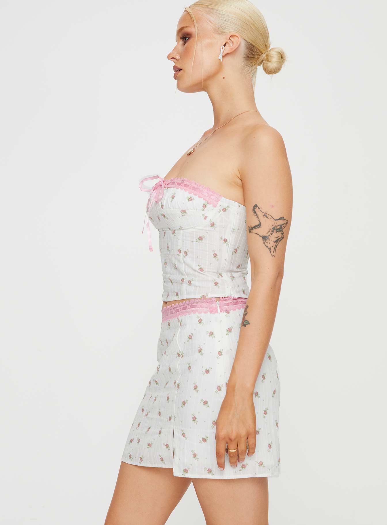 Pink and white floral mini skirt