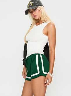 side view of model wearing Princess Polly Georgy Track Short Green High Waisted Shorts 