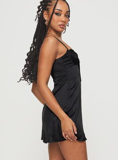 side view of model wearing Princess Polly Glitterberry Mini Dress Black Sweetheart Neckline 