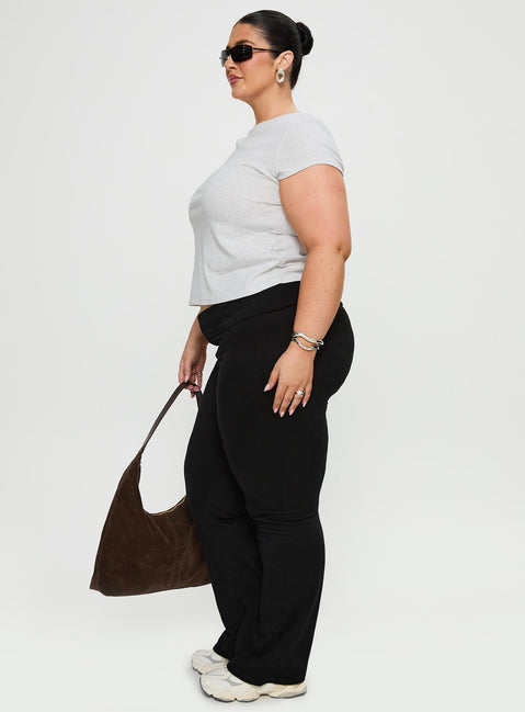 side view of model wearing Princess Polly Movement Yoga Pant Black Curve High Waisted Pants 