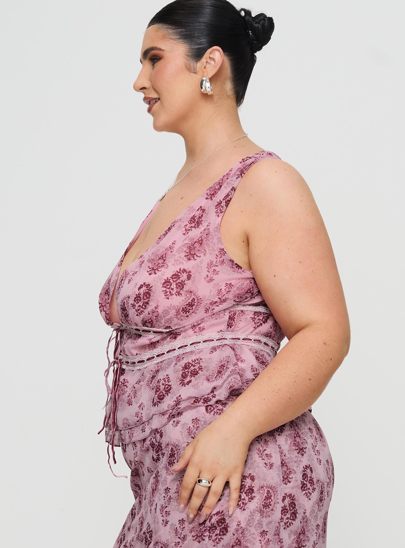 side view of model wearing Princess Polly Nikolise Top Purple Curve Sleeveless Plunger 