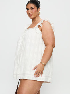 side view of model wearing Princess Polly Summerland Broiderie Mini Dress White Curve Square Neck 