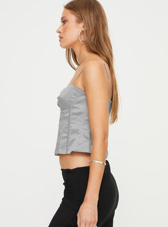 Satin bustier top Adjustable shoulder straps, sweetheart neckline, boning through front, zip fastening at back Non-stretch material, fully lined 