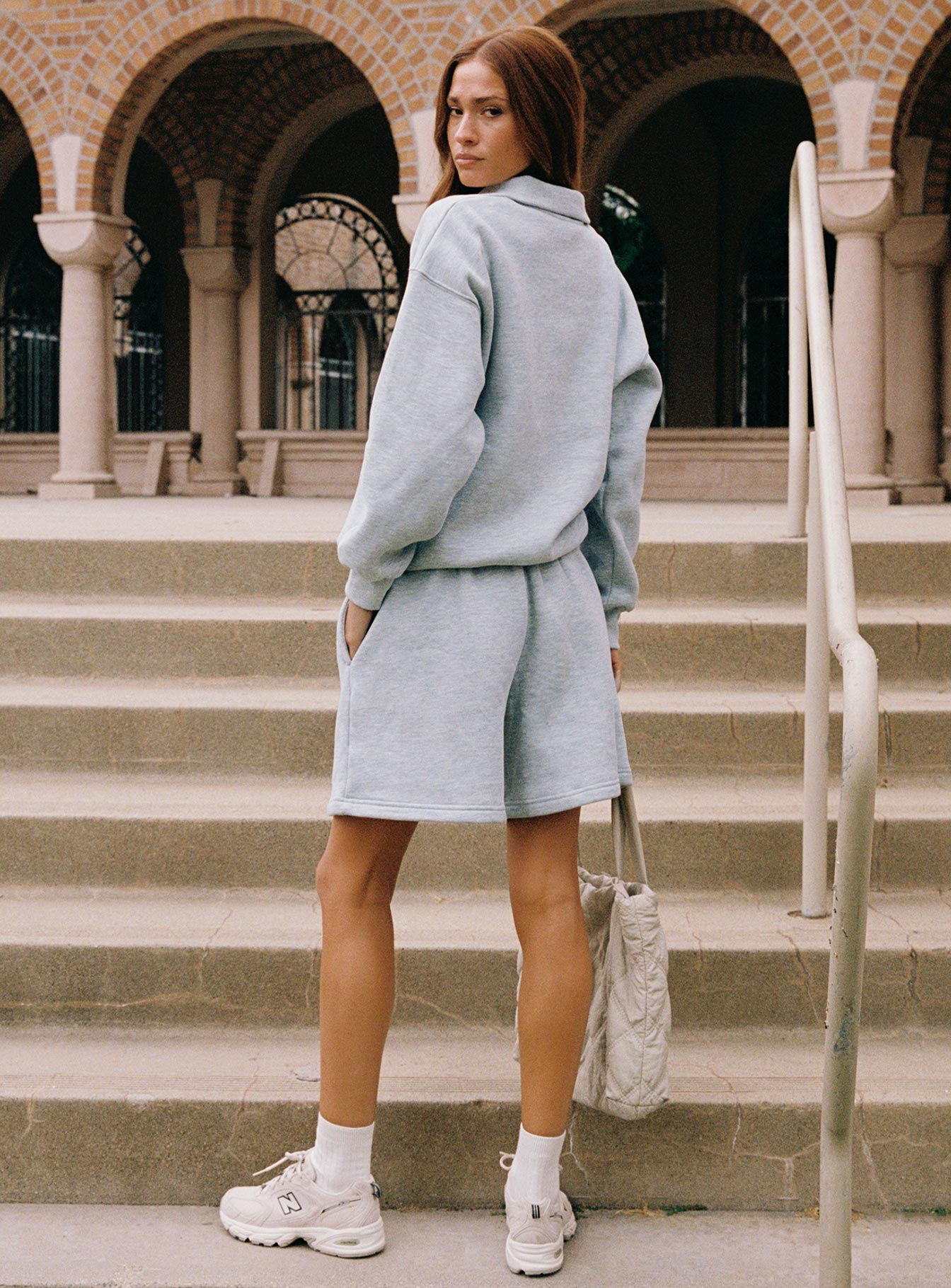 back view of model wearing Princess Polly Dream Fleece Quarter Zip Sweatshirt Grey Marle Longline Jumpers 