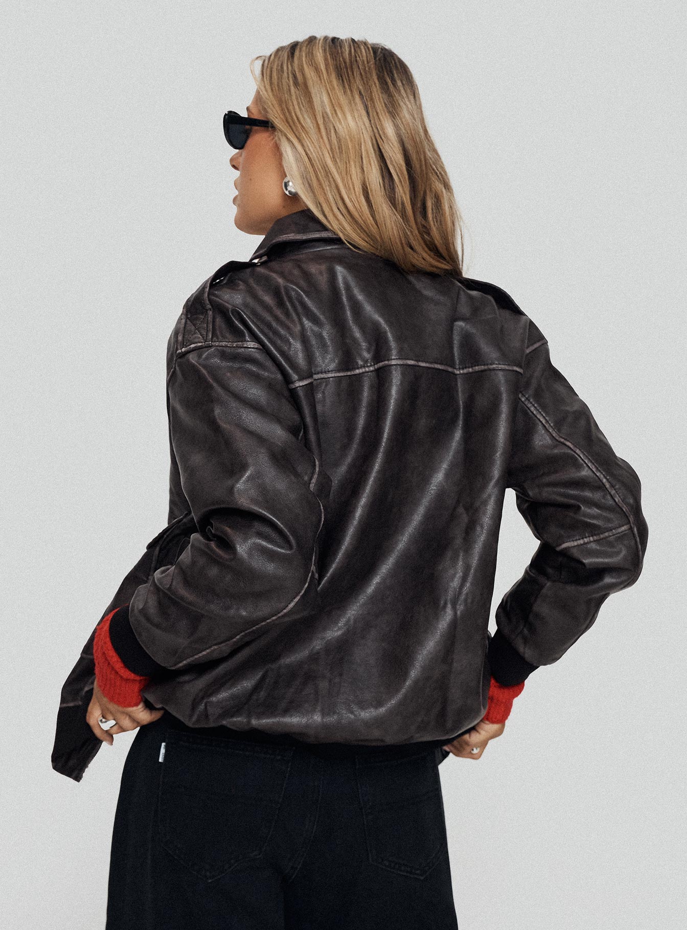 Faux leather jacket  Oversized fit, button & zip fastening at front, classic collar, four hip pockets, elasticated hem & cuffs Non-stretch material, fully lined 
