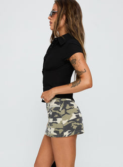   side view of model wearing Princess Polly Voltage Denim Mini Skirt Camouflage Skirts 