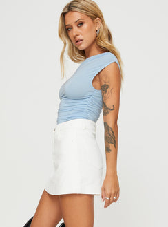 side view of model wearing Princess Polly Heuston Denim Skort White Denim High Waisted Shorts 