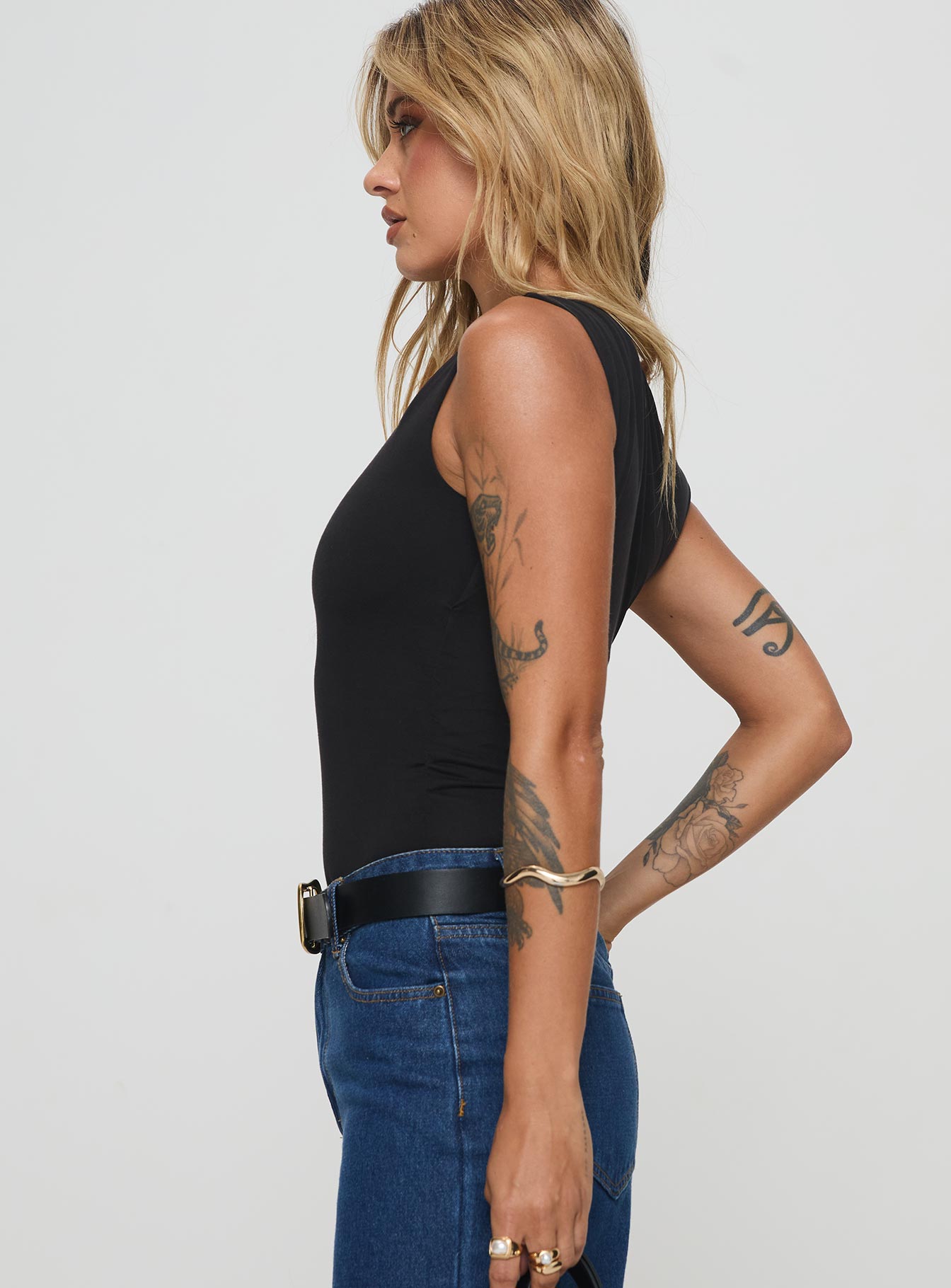 side view of model wearing Princess Polly Miyako Bodysuit Black Tall Sleeveless 