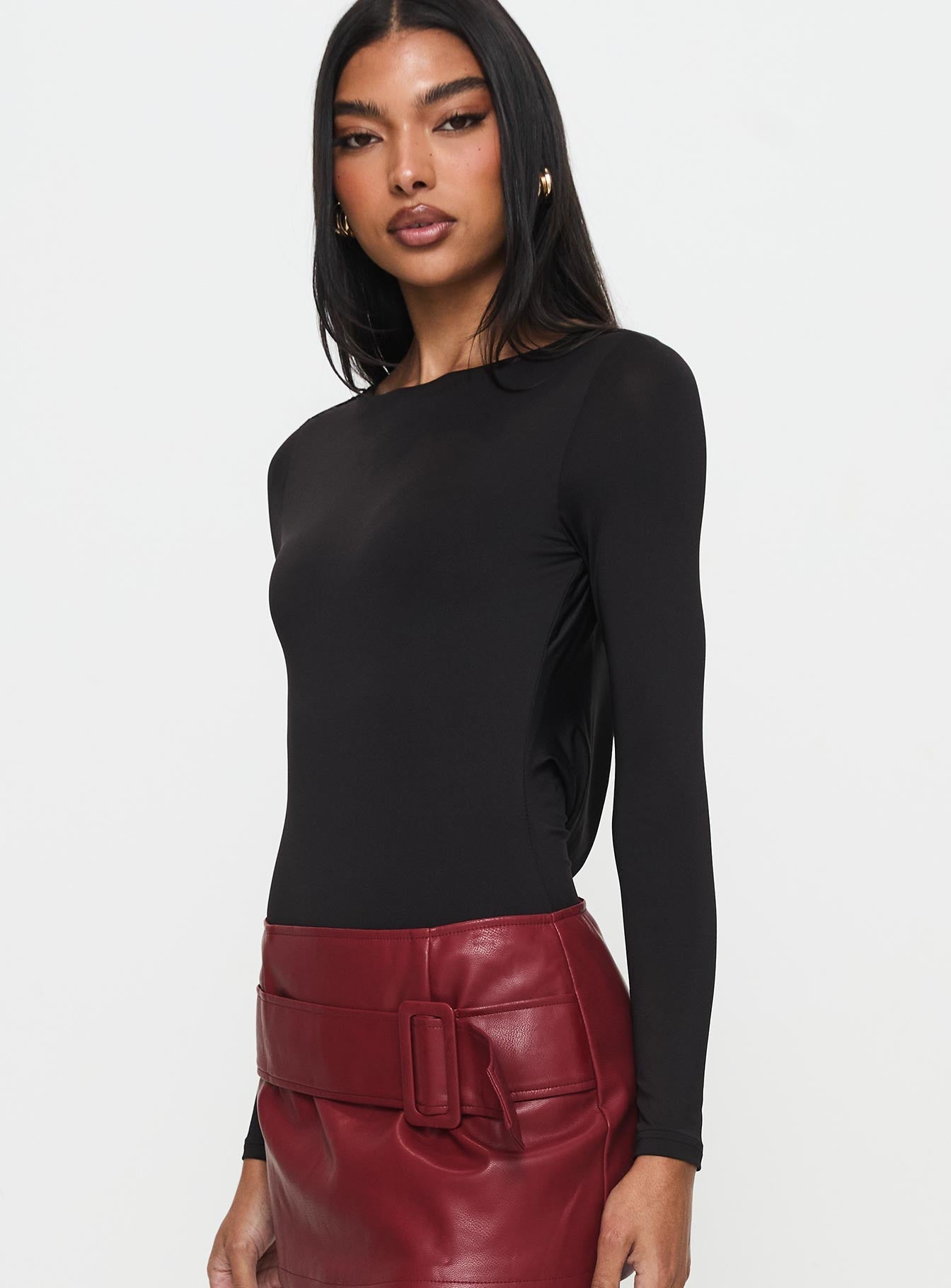 side view of model wearing Princess Polly Quinby Backless Long Sleeve Bodysuit Full Sleeves High Neck 
