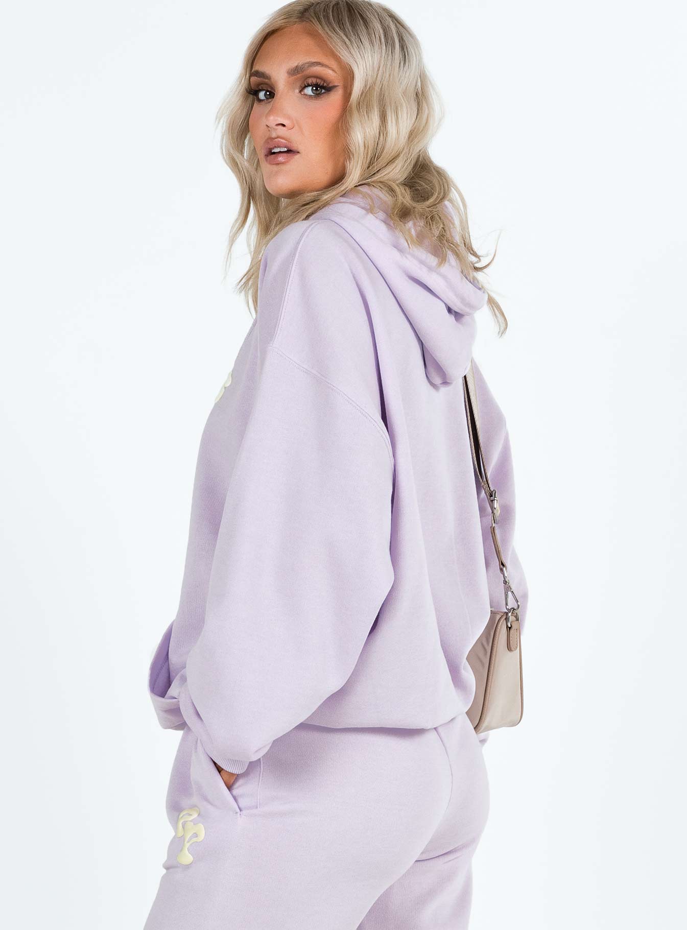 back view of model wearing Princess Polly Princess Polly Hooded Sweatshirt Squiggle Text Dusty Mauve / Eggshell regular 