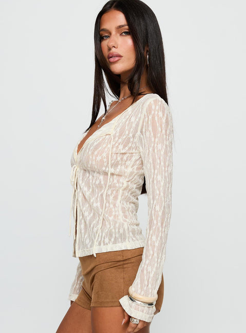 side view of model wearing Princess Polly Open Your Heart Tie Detail Long Sleeve Top Cream Full Sleeves Scoop Neck 