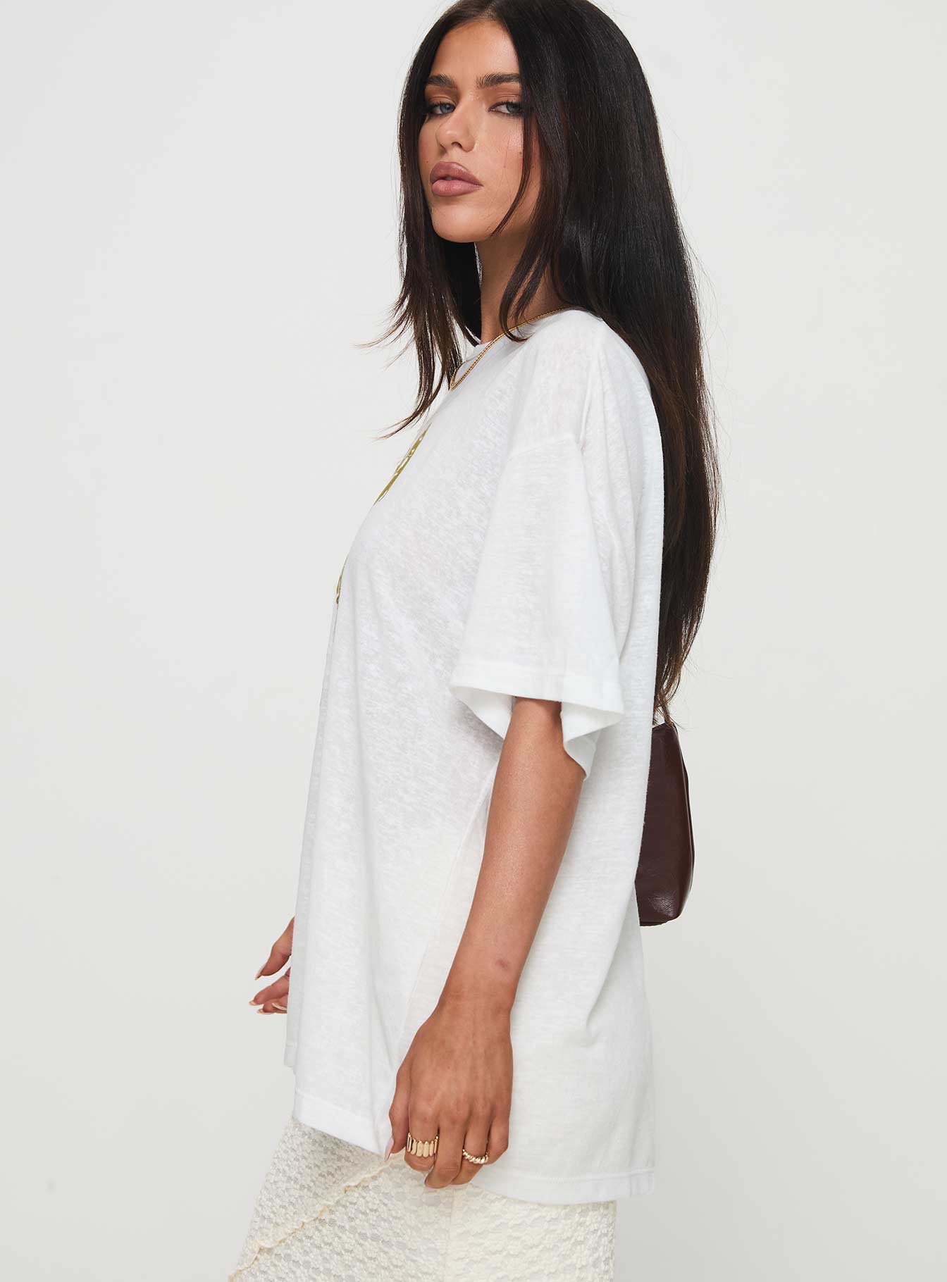 side view of model wearing Princess Polly Nozomi Tee White Half Sleeves Crew Neck 