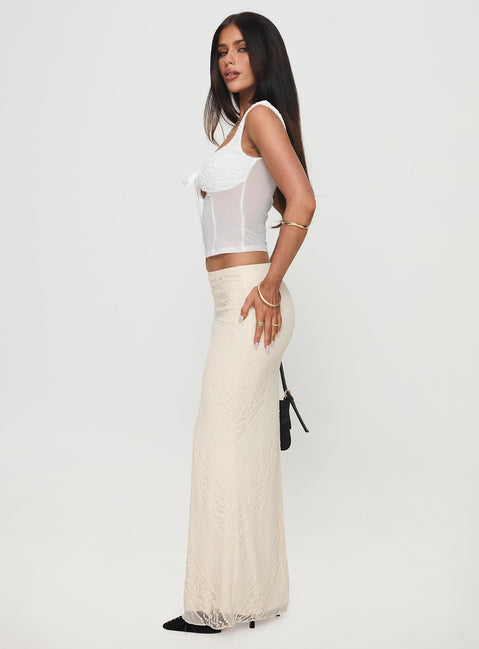   side view of model wearing Princess Polly Gazet Maxi Skirt Cream Maxi 
