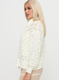side view of model wearing Princess Polly Sirena Zip Through Knit Sweater Cream 