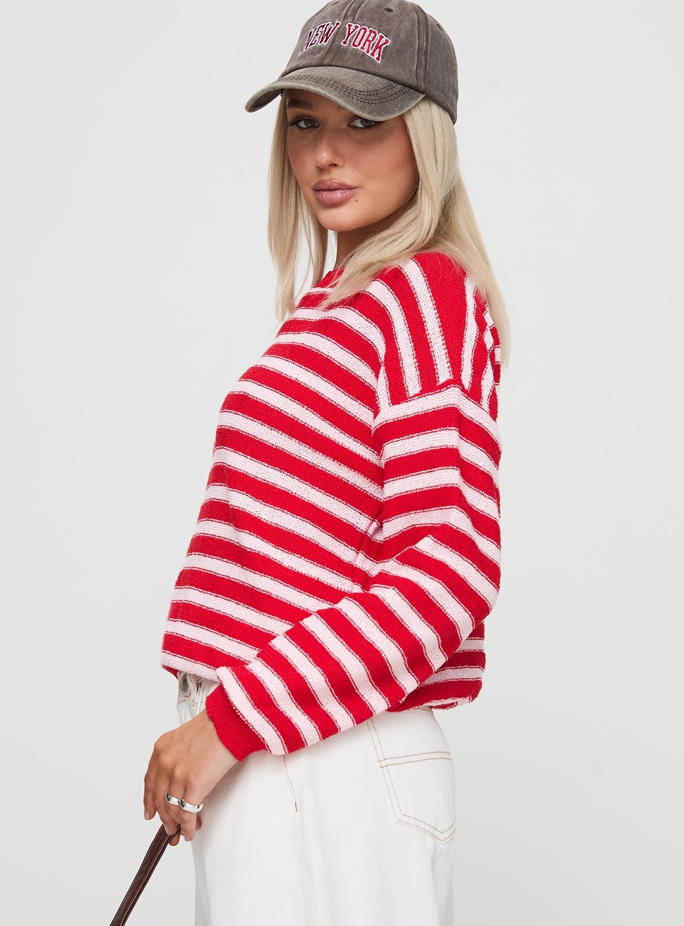 side view of model wearing Princess Polly Freeze Knit Sweater Red Cropped 