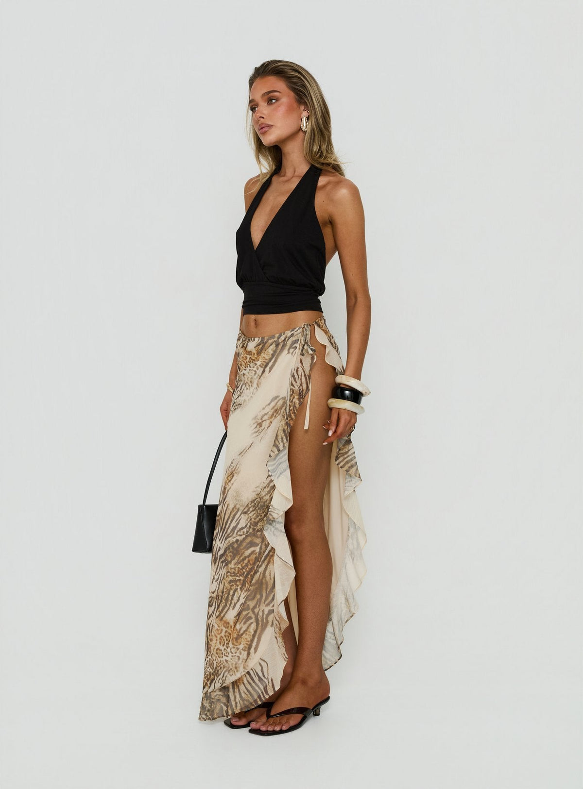 Presenting the Argenzia Sarong Maxi Skirt Animal Multi in womens-skirts with maxi length side view of model wearing Princess Polly