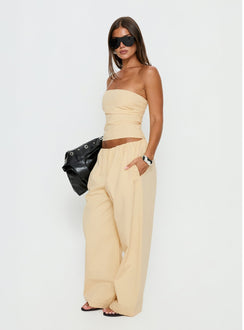 side view of model wearing Princess Polly Tidekiss Pants Lemontini Mid Rise Pants 