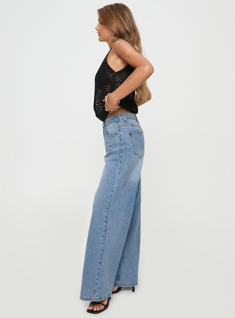 side view of model wearing Princess Polly Colemane Mid Rise Denim Jeans Angel Blue Petite Mid Rise 