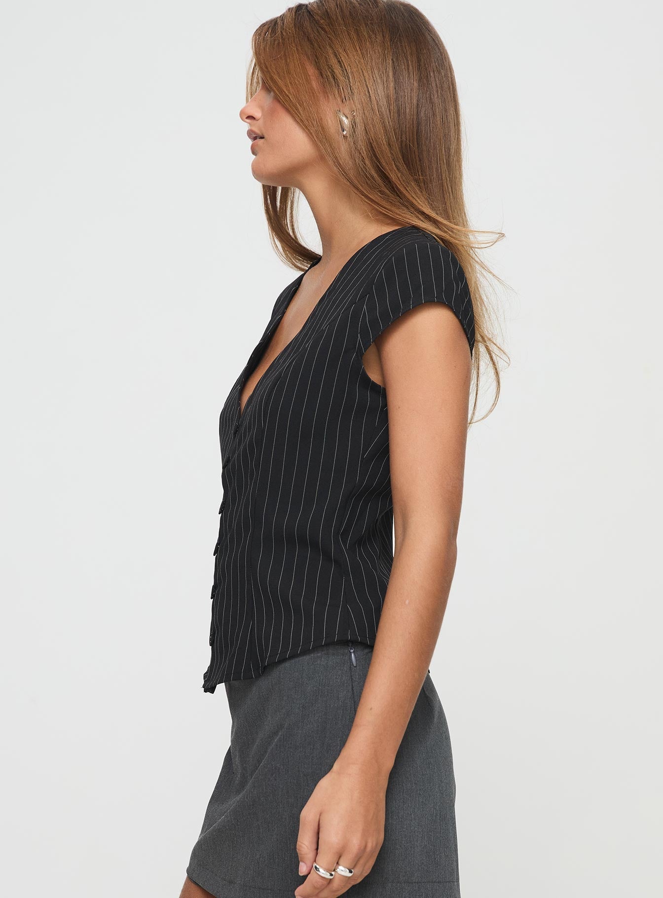 Top Vest style, pinstripe print, button fastening