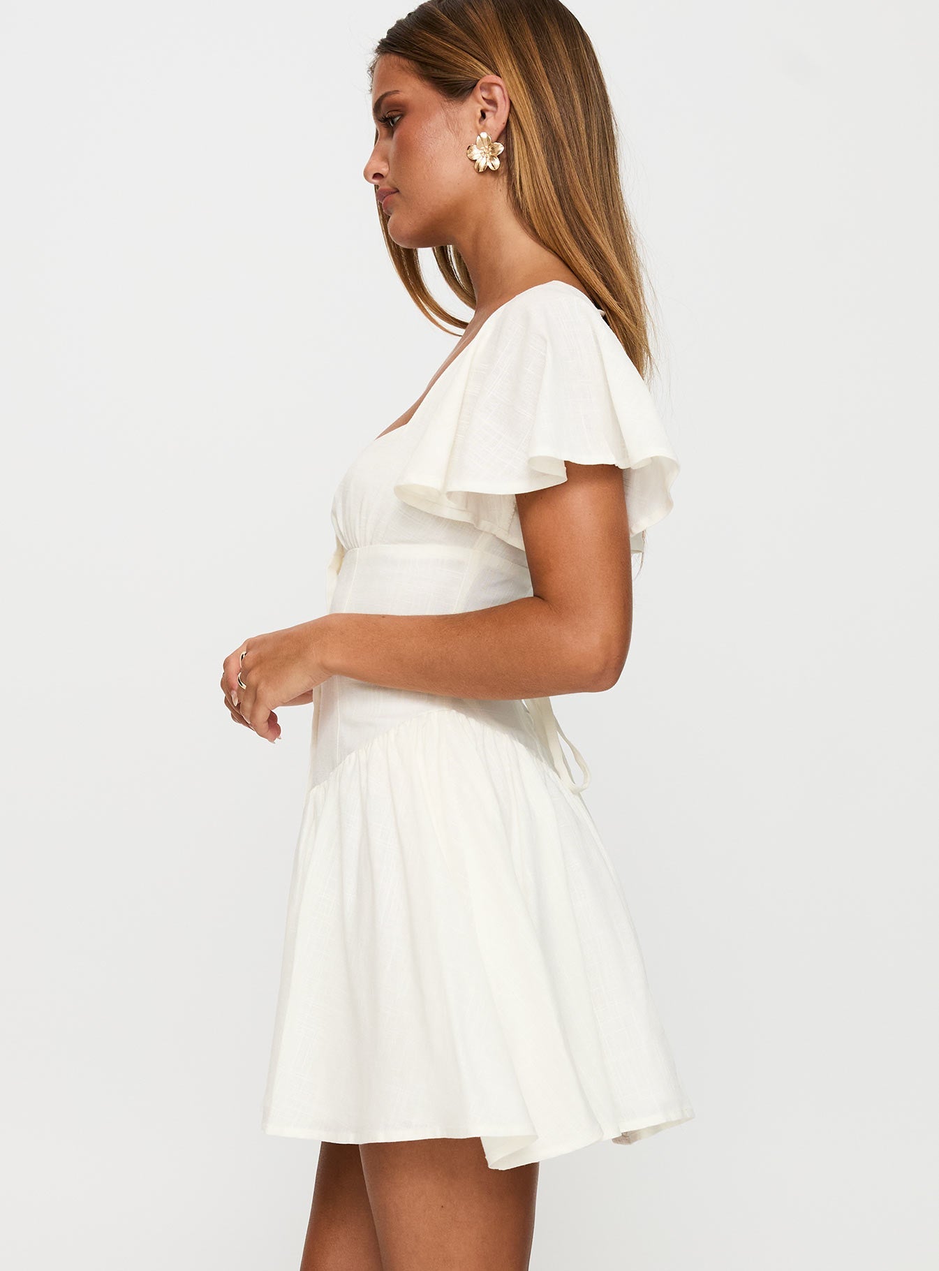 side view of model wearing Princess Polly Forever More Mini Dress White Square Neck 