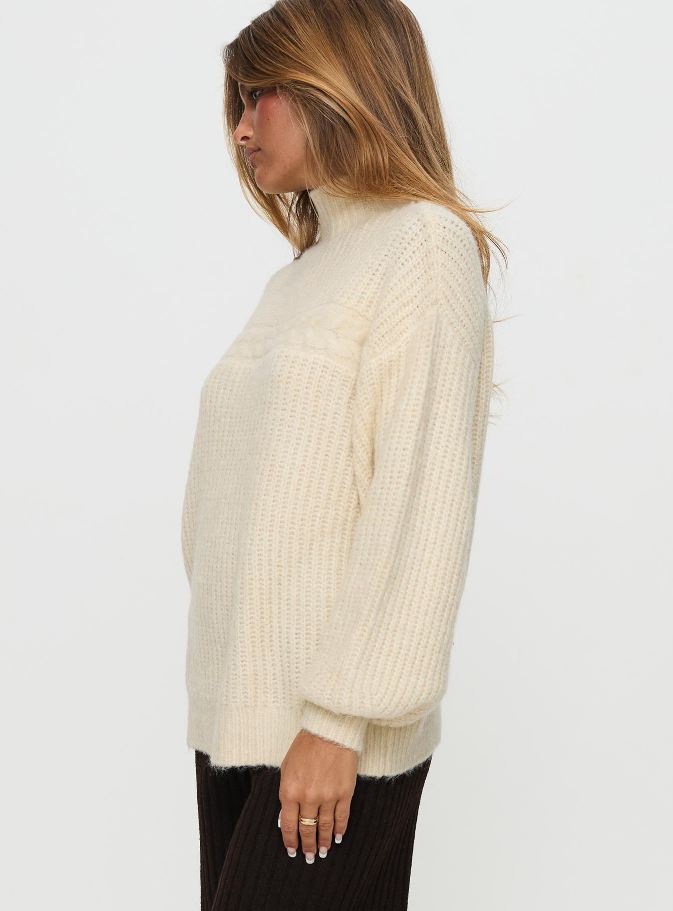 side view of model wearing Princess Polly Wistfully Funnel Neck Knit Sweater Cream Long 