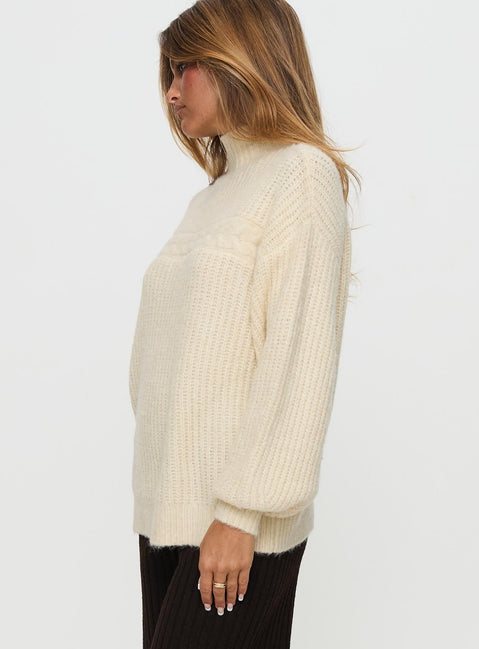 side view of model wearing Princess Polly Wistfully Funnel Neck Knit Sweater Cream Long 