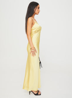 side view of model wearing Princess Polly Treasure Bias Cut Maxi Dress Lemon V-Neck 