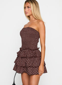 side view of model wearing Princess Polly Sunkiss Frill Mini Dress Brown Polka Straight Neck 