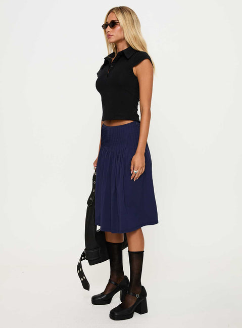   side view of model wearing Princess Polly Elaila Pleat Midi Skirt Navy Midi Skirts 
