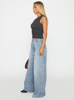 side view of model wearing Princess Polly Bowe Wide Leg Jeans Blue High Waisted 