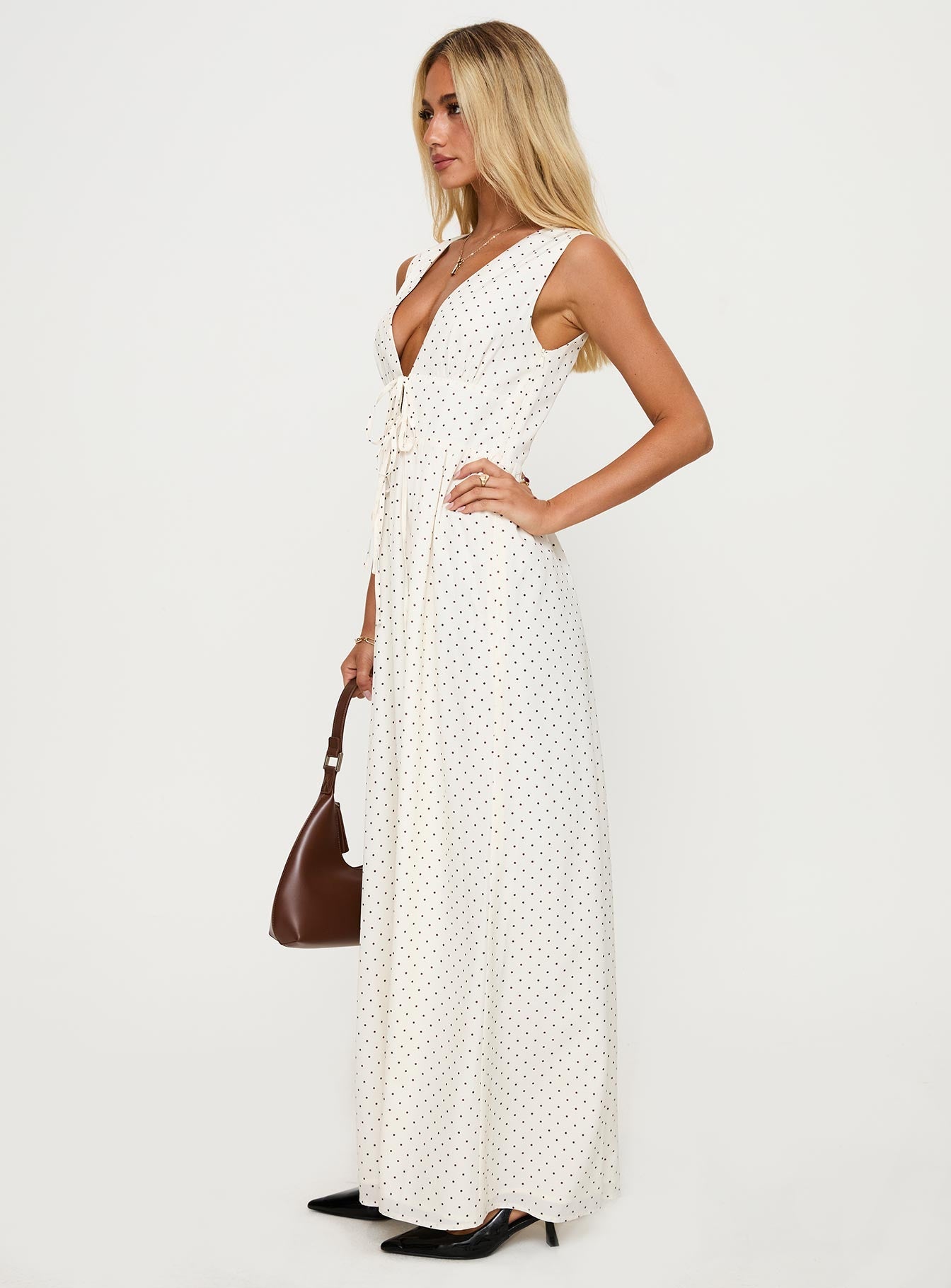 side view of model wearing Princess Polly Pokey Maxi Dress Cream / Polka Dot Plunger 