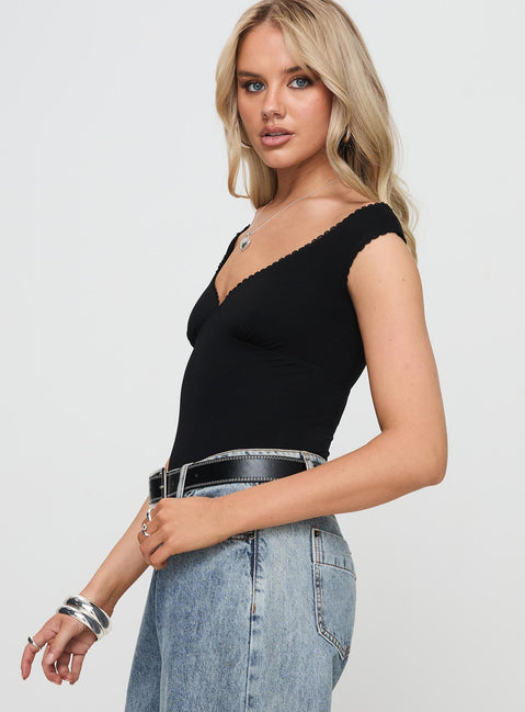 side view of model wearing Princess Polly Faure Bodysuit Black Sleeveless V-Neck 