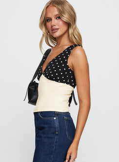 side view of model wearing Princess Polly Silverstone Top Multi Sleeveless V-Neck 