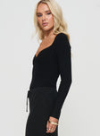 Long sleeve bodysuit Ribbed knit material, twist detail at bust, high cut leg, cheeky style bottom, press clip fastening at base Good stretch, unlined