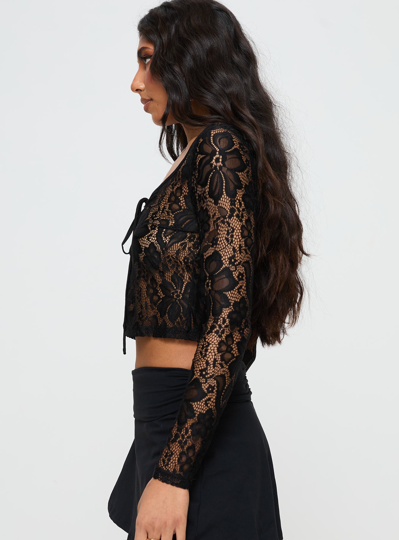 Black Long sleeve lace top Scooped neckline, tie & button fastening at bust, split hem