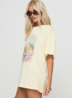 side view of model wearing Princess Polly Hotel Hawaii Oversized Tee Yellow Half Sleeves Crew Neck 