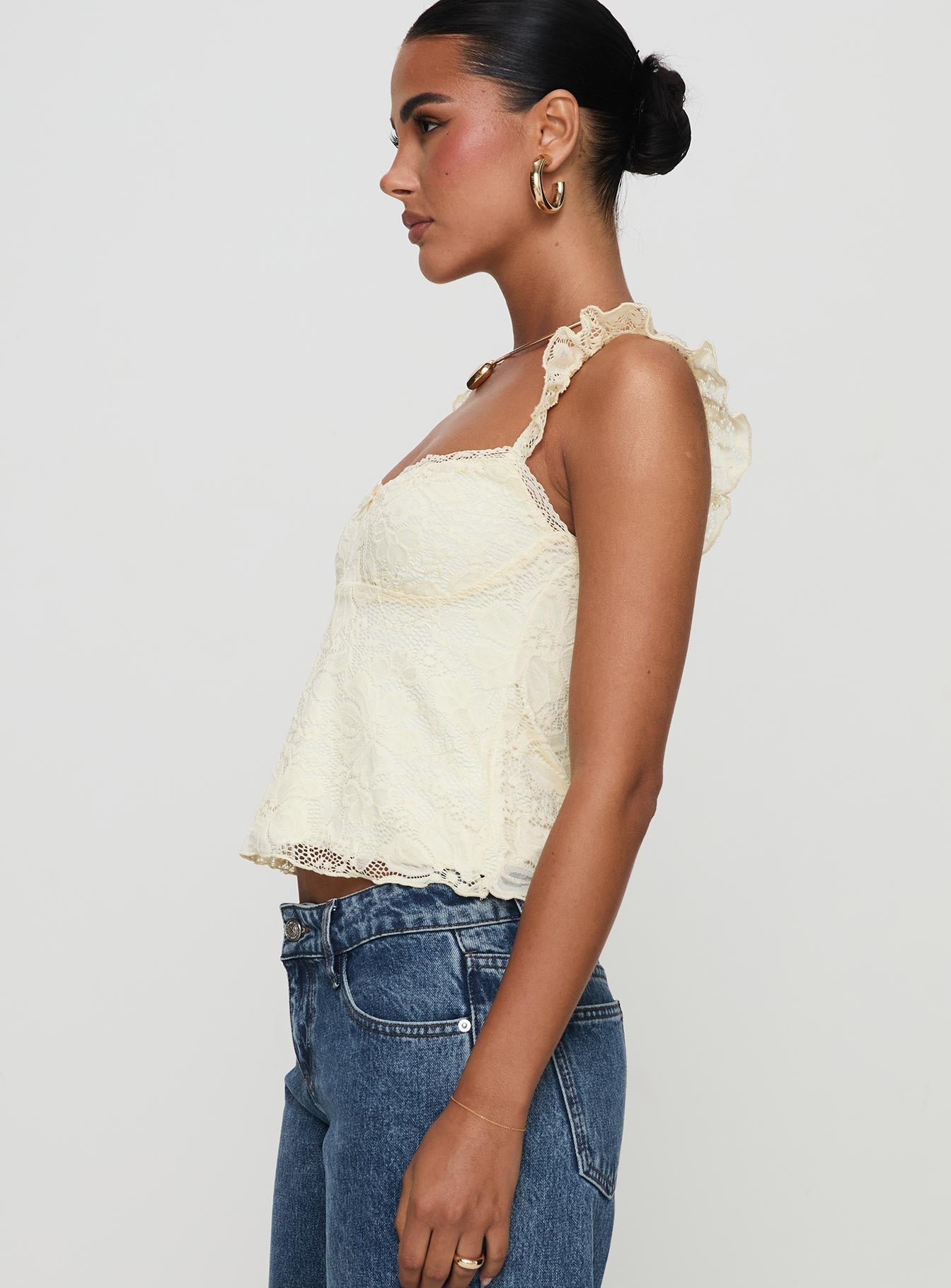 side view of model wearing Princess Polly Madaleine Lace Top Cream Sleeveless Square Neck 