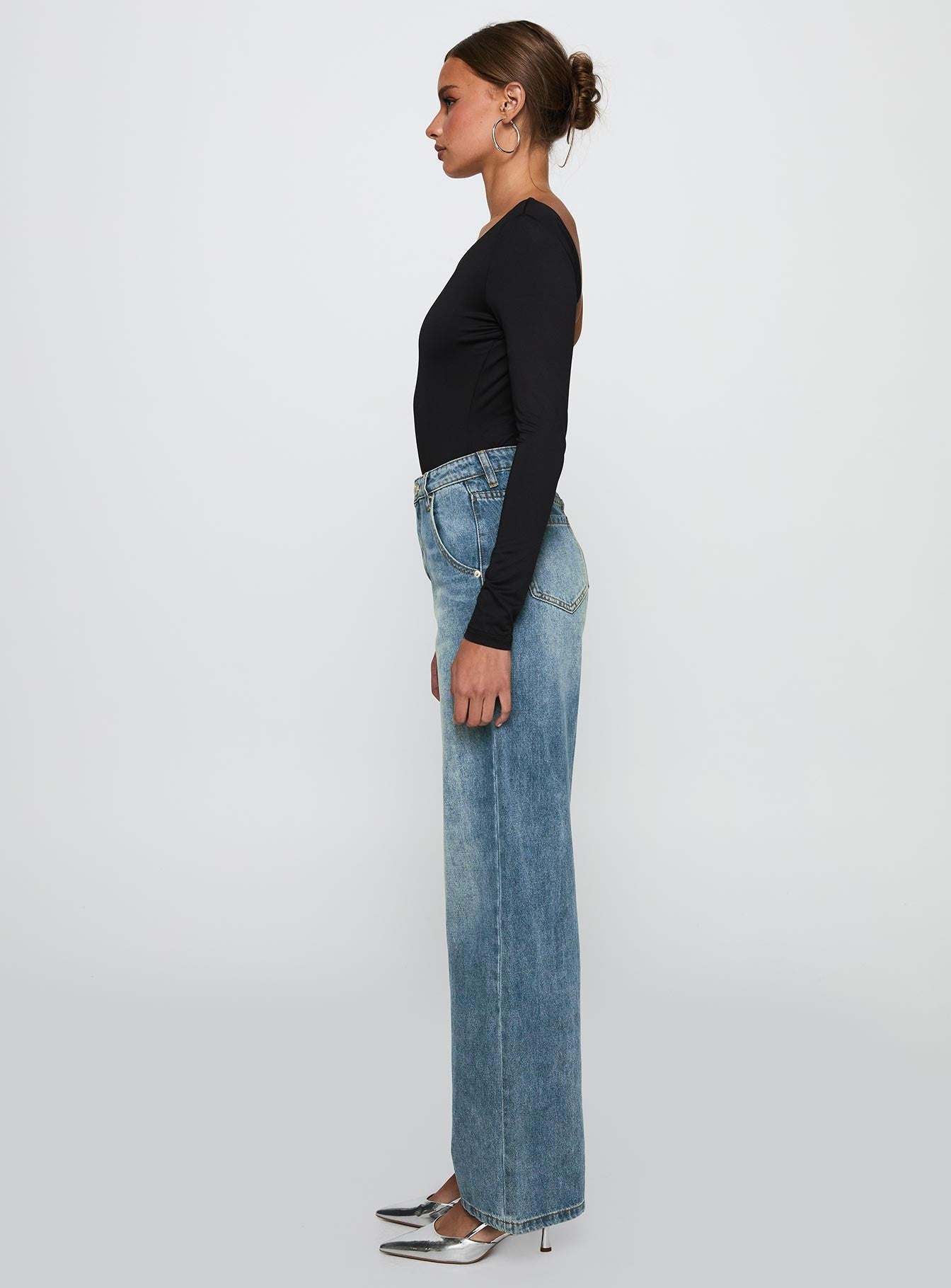side view of model wearing Princess Polly Sacramento Straight Leg Jeans Mid Blue Denim High Waisted 