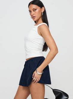   side view of model wearing Princess Polly Ghost Mini Skirt Mineral Mini Skirts 