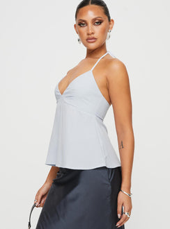 side view of model wearing Princess Polly Orwell Top Blue Sleeveless Plunger 