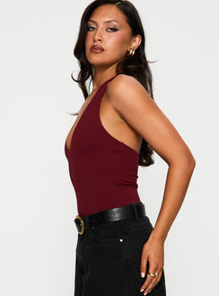 side view of model wearing Princess Polly Someone New Halter Bodysuit Burgundy Sleeveless 
