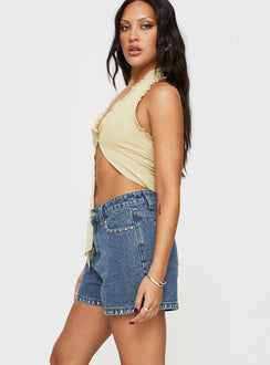 Denim shorts High rise fit, silver studded detailed, classic five pocket design, belt loops at waist, zip and button fastening, branded patch at back