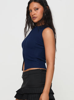 side view of model wearing Princess Polly Suzu Sleeveless Top Navy Sleeveless High Neck 