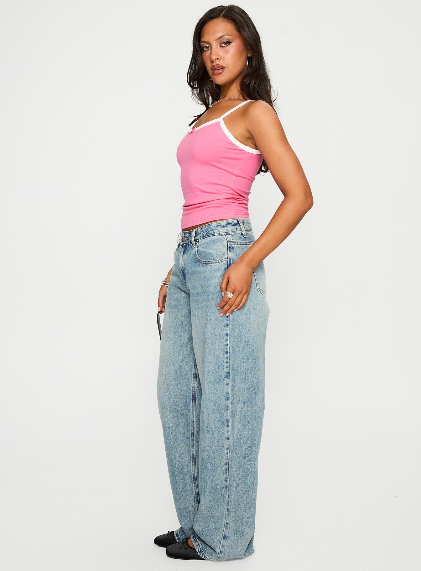 side view of model wearing Princess Polly Edge Of Town Jeans Vintage Blue Mid Rise 