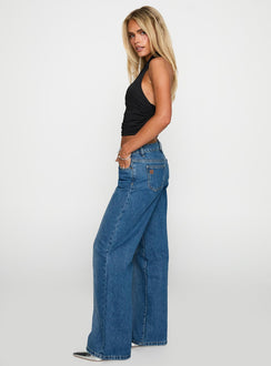 side view of model wearing Princess Polly On Sunset Mid Rise Straight Leg Jeans Dark Wash Mid Rise 